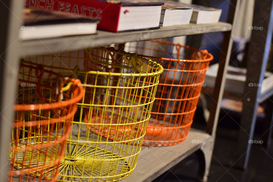 Papa of Orange. Colorful yellow and orange wire baskets