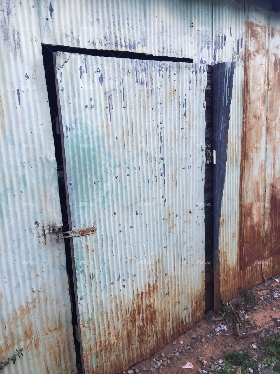 Old  white door on an old building in our town. 