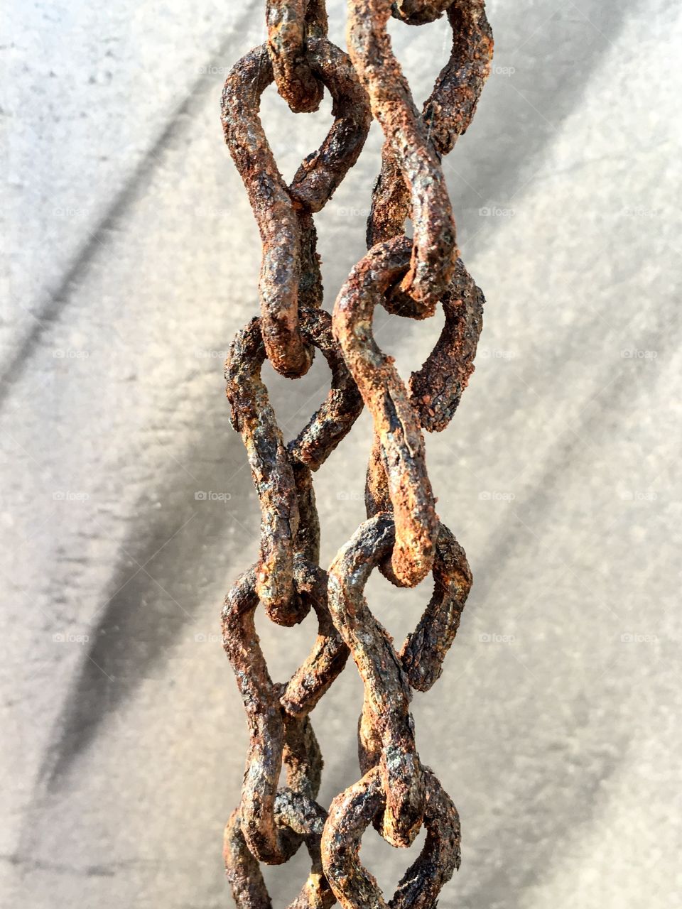 Antique rusted old hanging chain outdoors grunge 