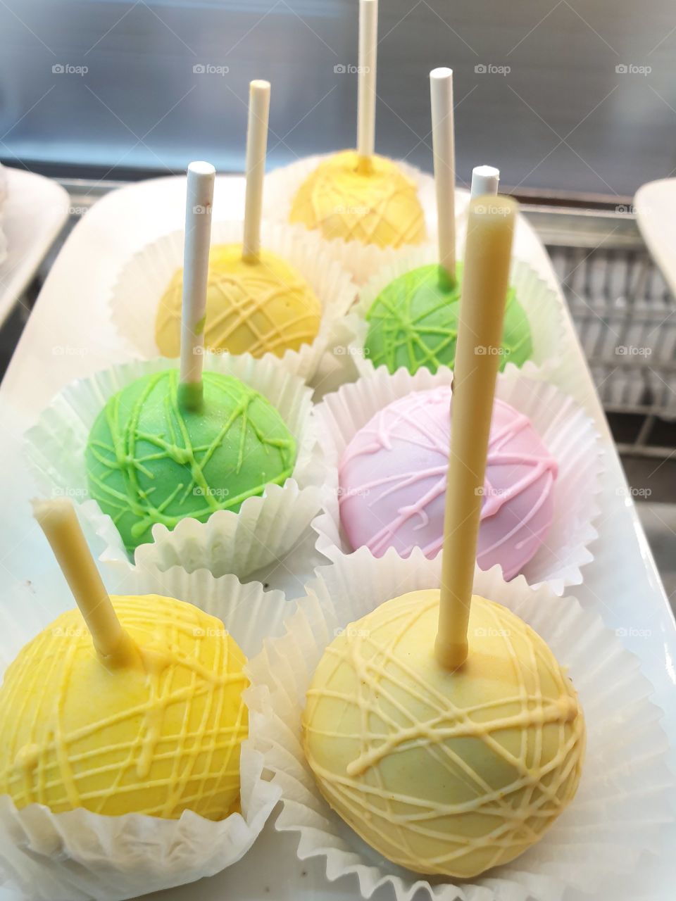colorful chupa chups style cakes
