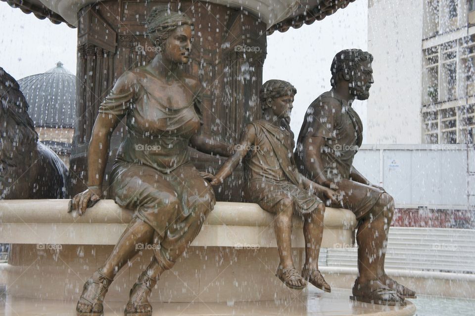 Family on a fountain 