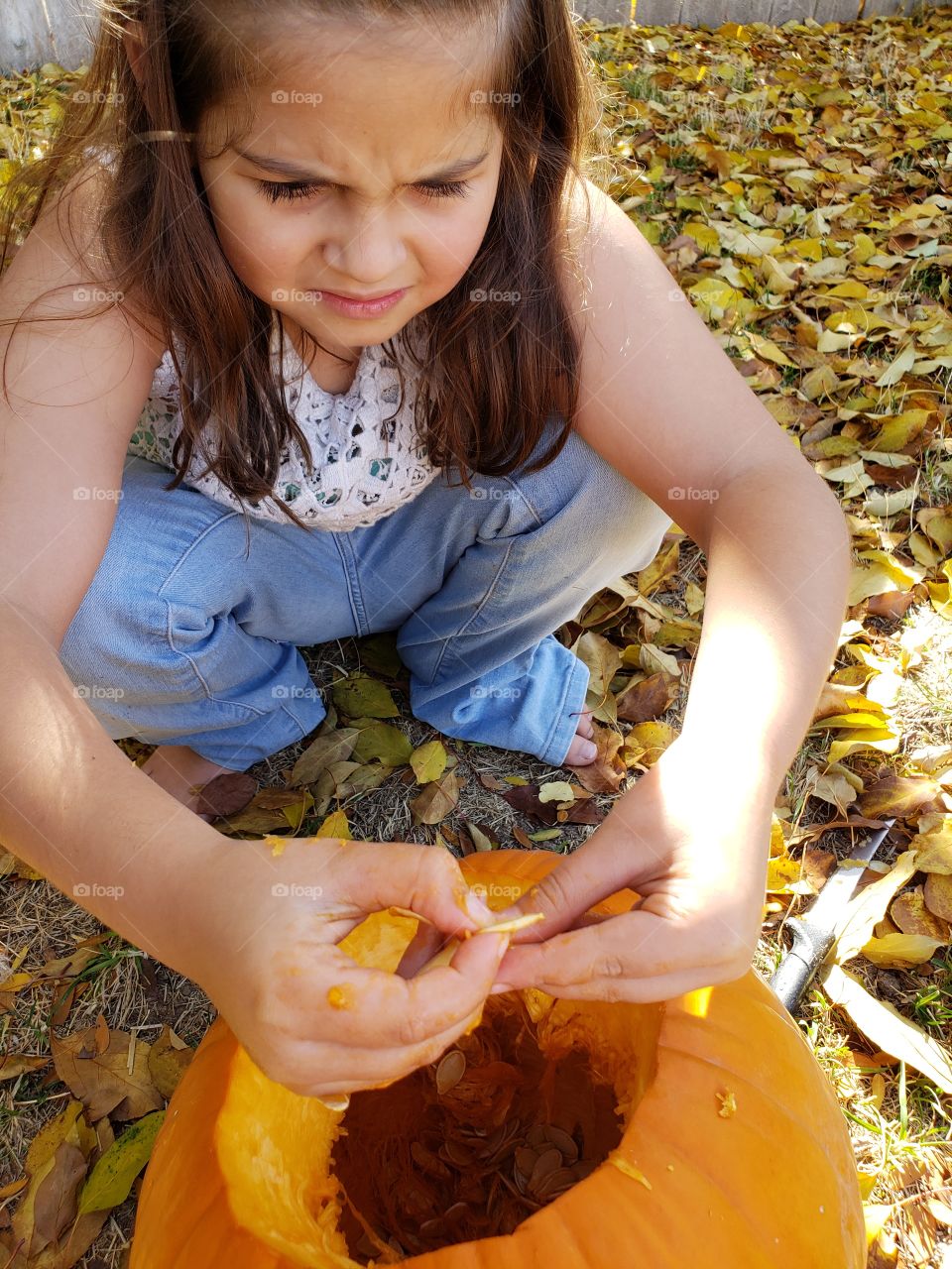 gutting the pumpkin slimy hands