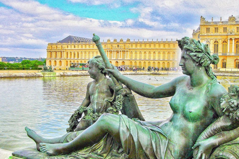 Sculptures gracing lake at Palais de Versailles 
