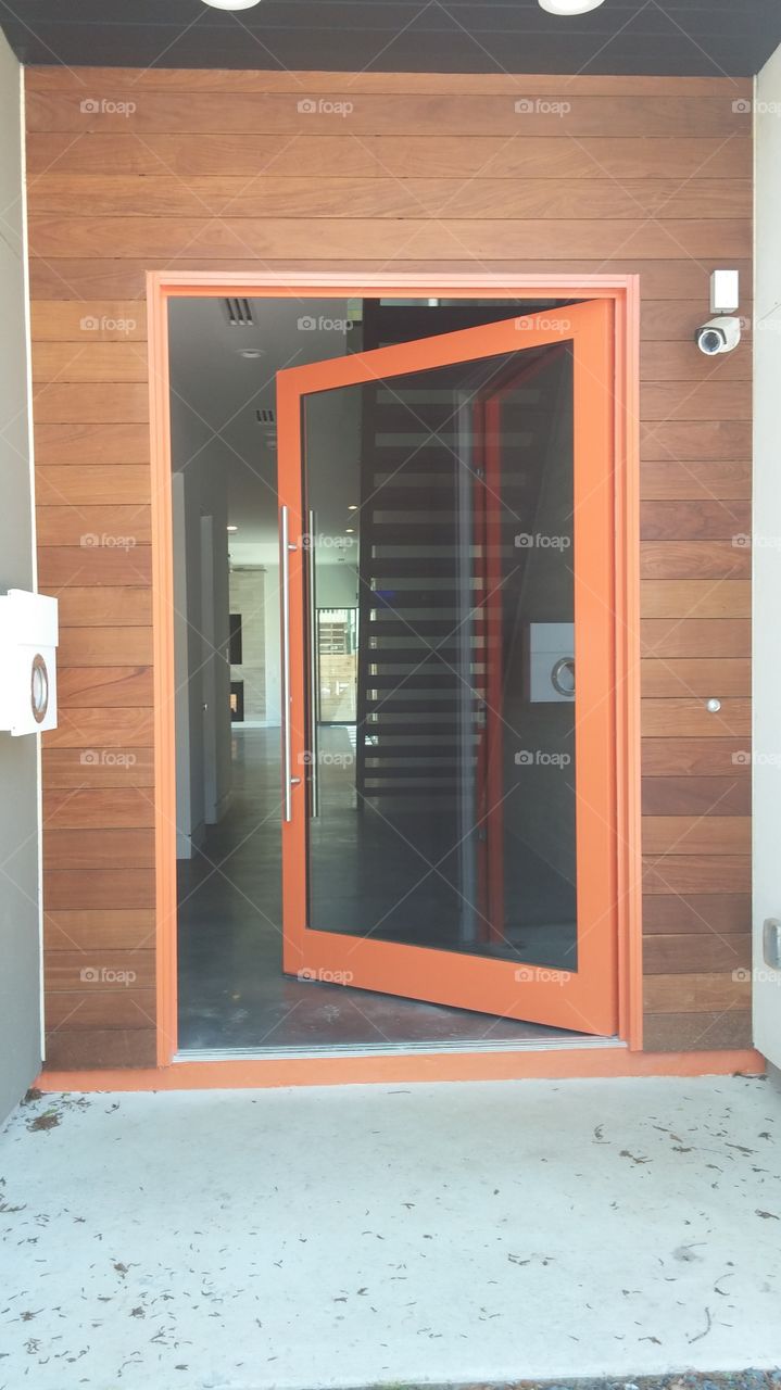 orange door. gorgeous front door of a contemporary/modern home
