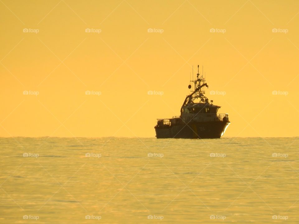 Boat in sunset