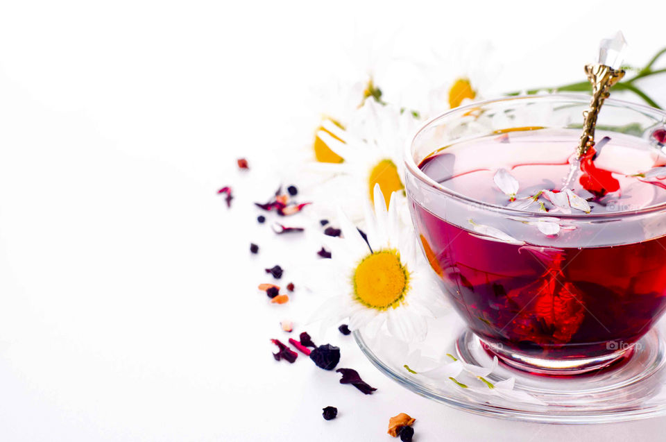 Close-up of red herbal tea in cup