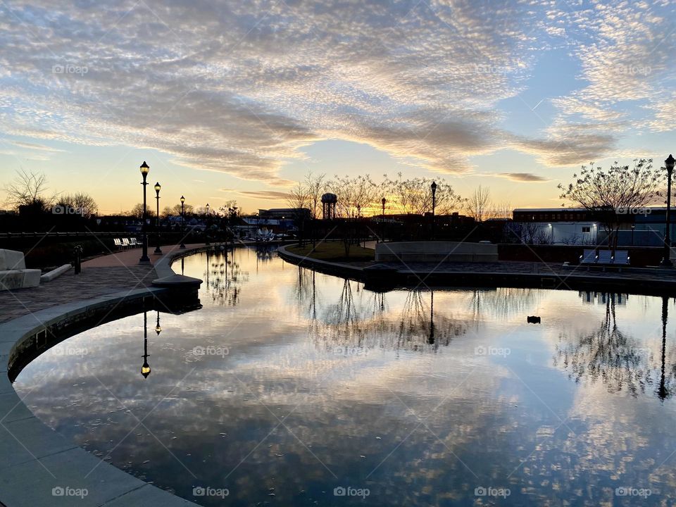 Reflections in a canal at sunset