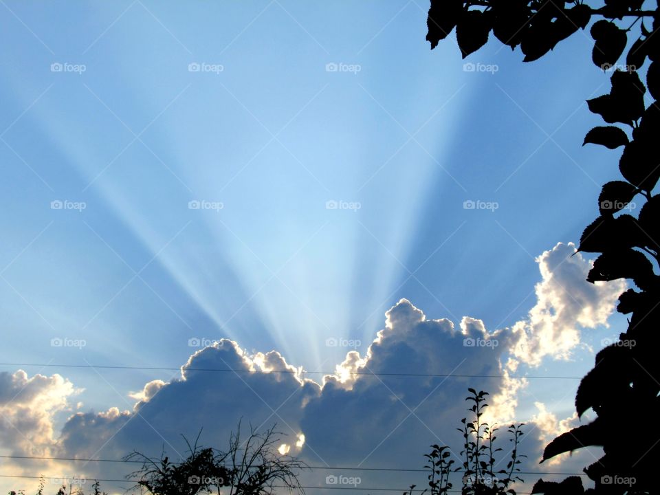 blue sky, clouds, sun rays