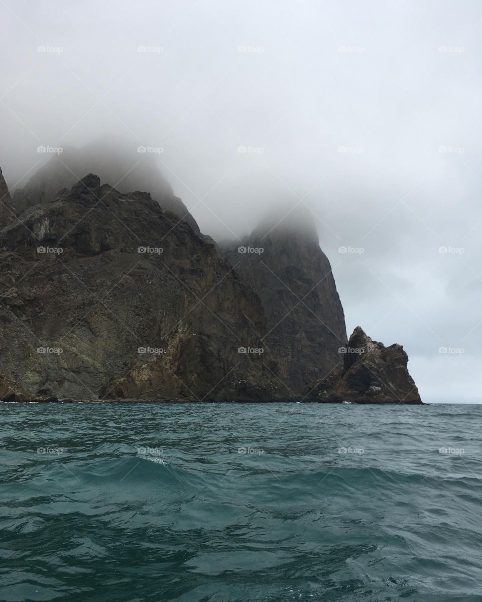 Coastal rocks in fog