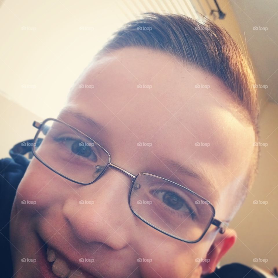 Smiling boy wearing eyeglasses