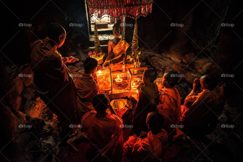 Monks praying inside a temple