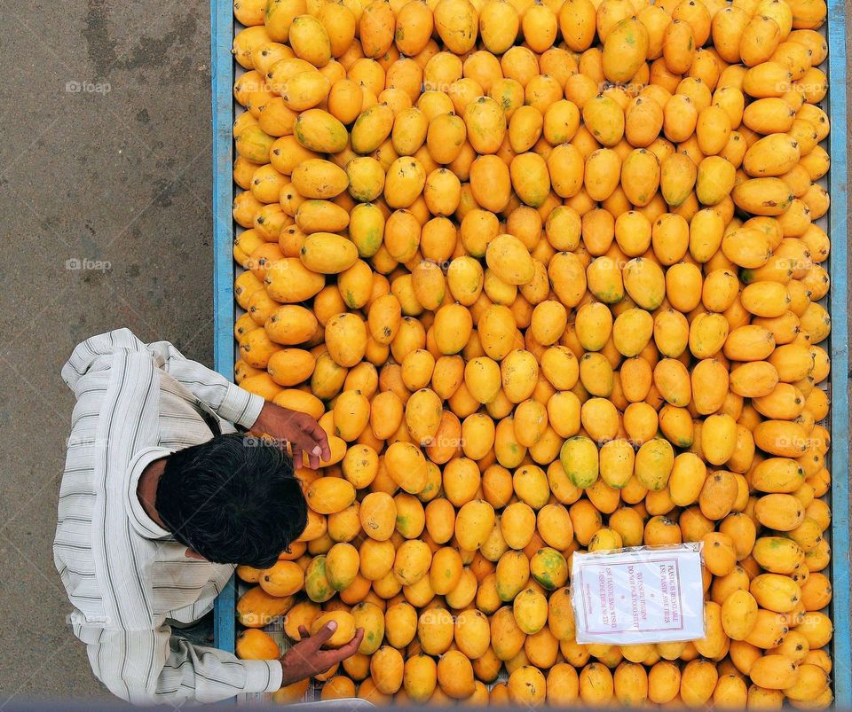 High angle view of mangoes for sale