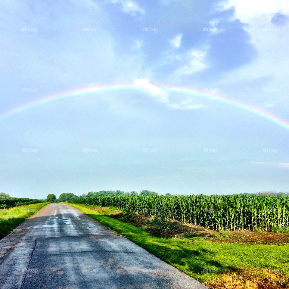 Rainbow. Taken in Bath, Indiana my hometown.  Nothing better then leaving Chicago to go home to this view:)