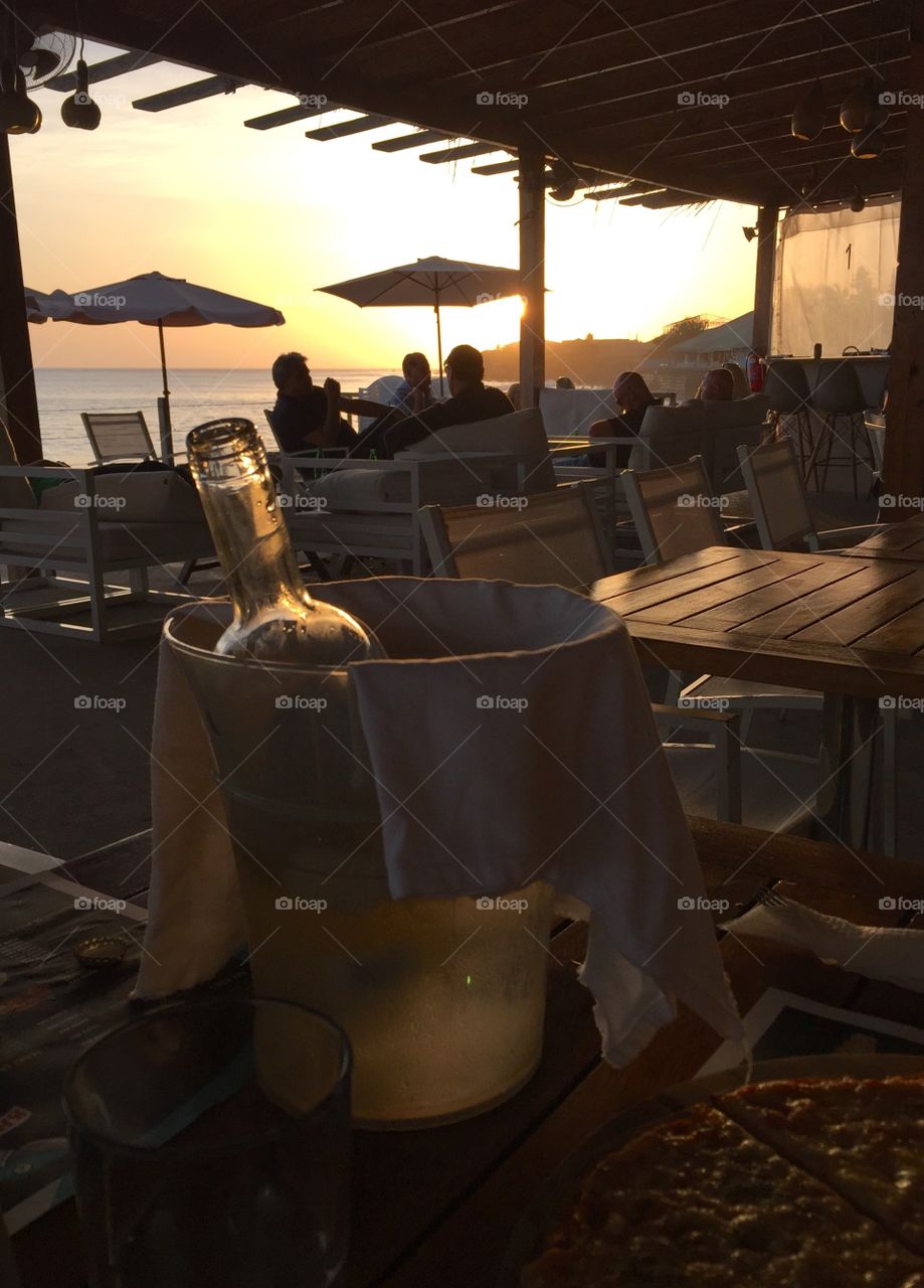 Wine bucket at sunset