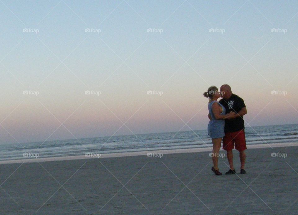 Sunset Kisses . Hilton Head kissing on the beach
