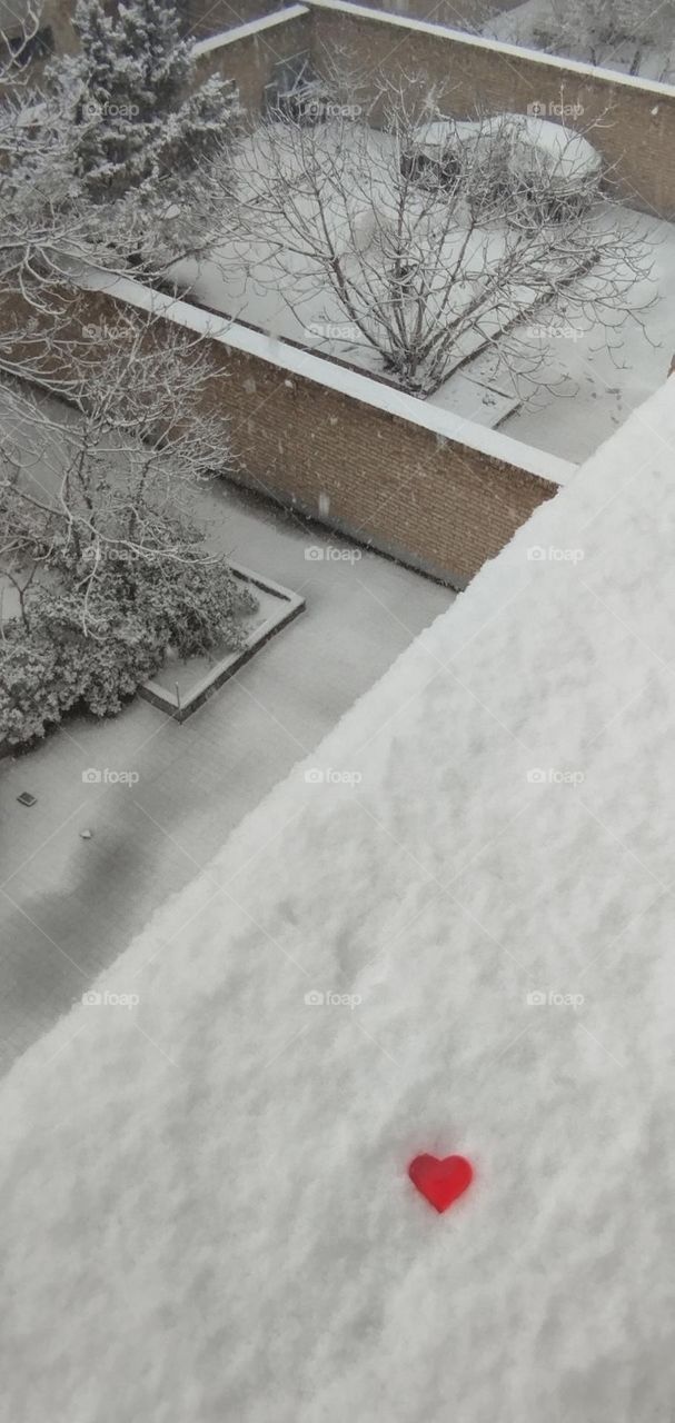 The first winter snow made everyone happy. I also took the opportunity to take a photo of my snow triangles from the balcony of our house, which includes some snowy yards of the apartments and red heart with snowy background in one frame