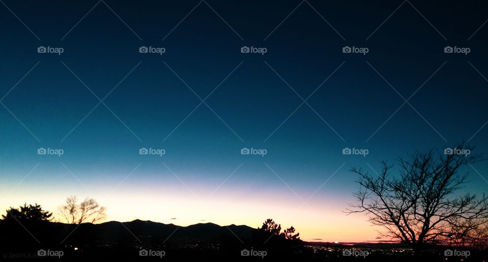 Overlooking mountain city at sunset