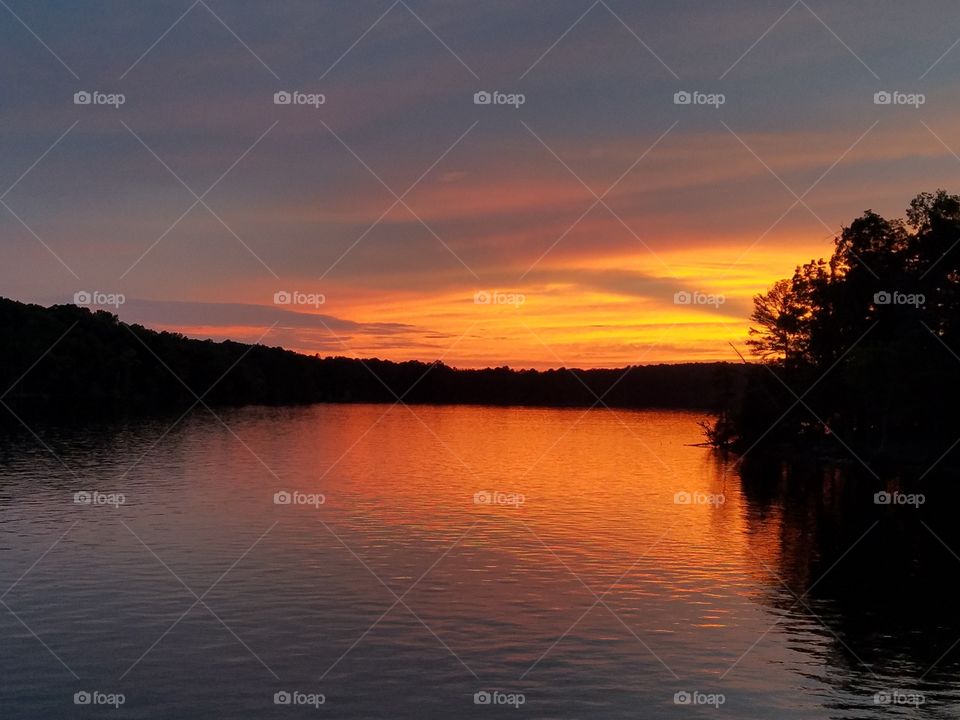 beautiful colorful sunset over lake