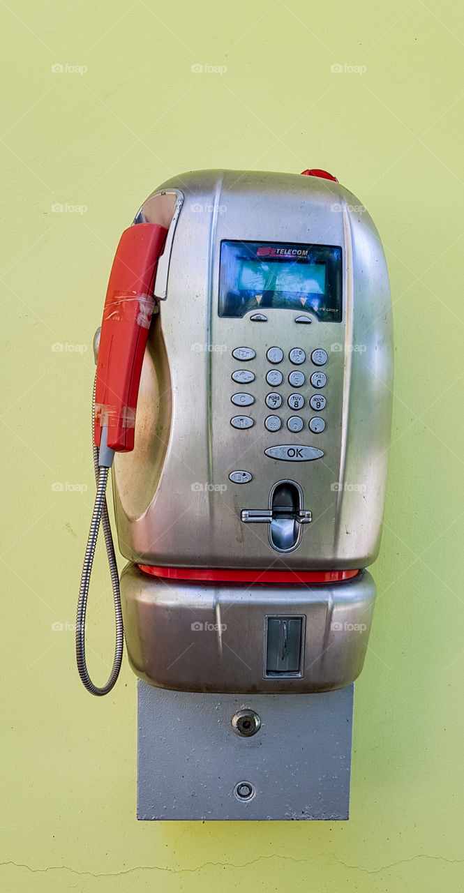 old coin-operated phone