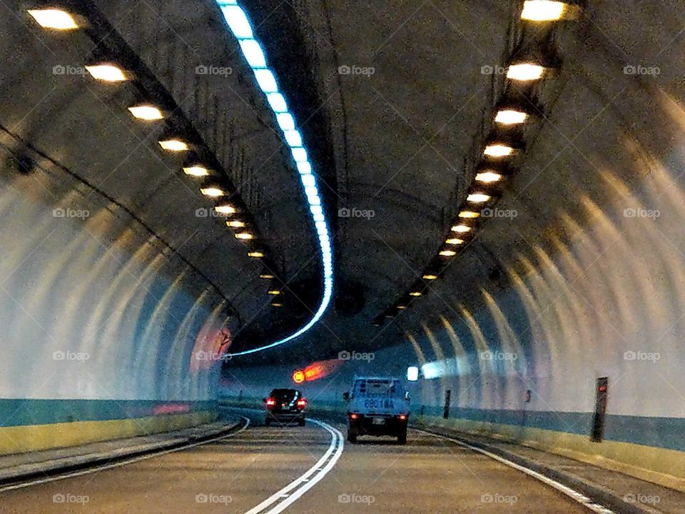 From A to B: go through the tunnel. from city to city. important transportation system. the tunnel shorten distance of two cities or two places.