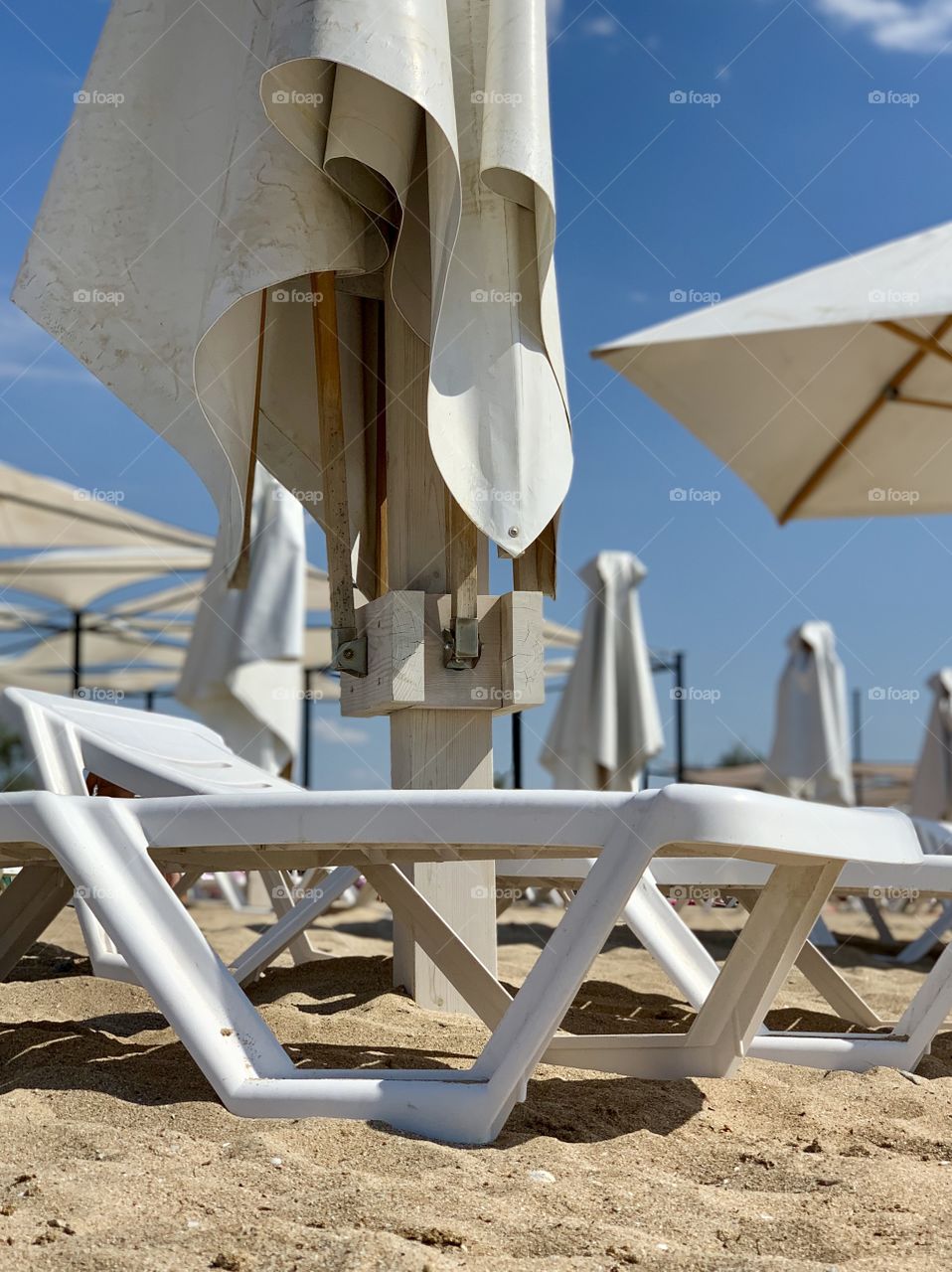 sun loungers and parasols on the beach