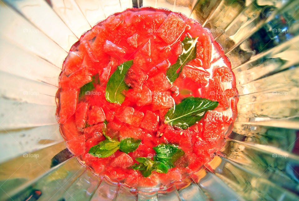 Infused watermelon cake on table