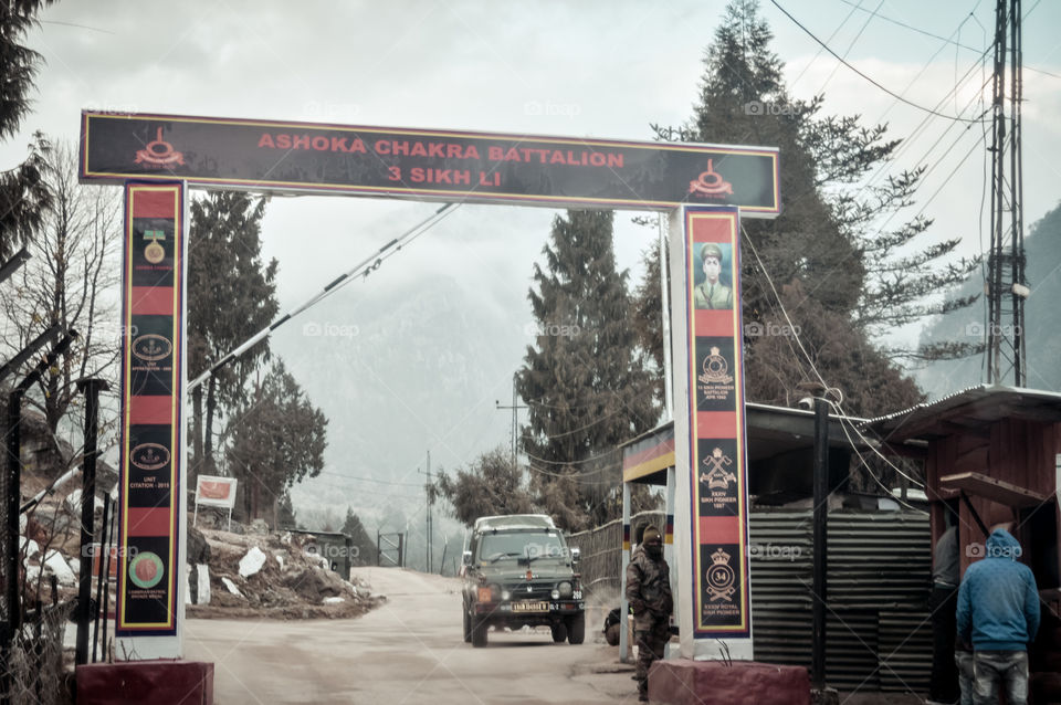 Pulwama, Jammu Srinagar National Highway, India 14 February 2019: Indian BSF major watches Indian post after attacked by vehicle-borne suicide bomber by Pakistani Islamist militant Jaish-e-Mohammed
