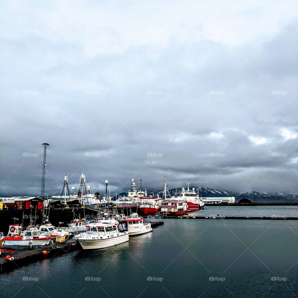 Boats Docked In A Gloomy Port In Iceland