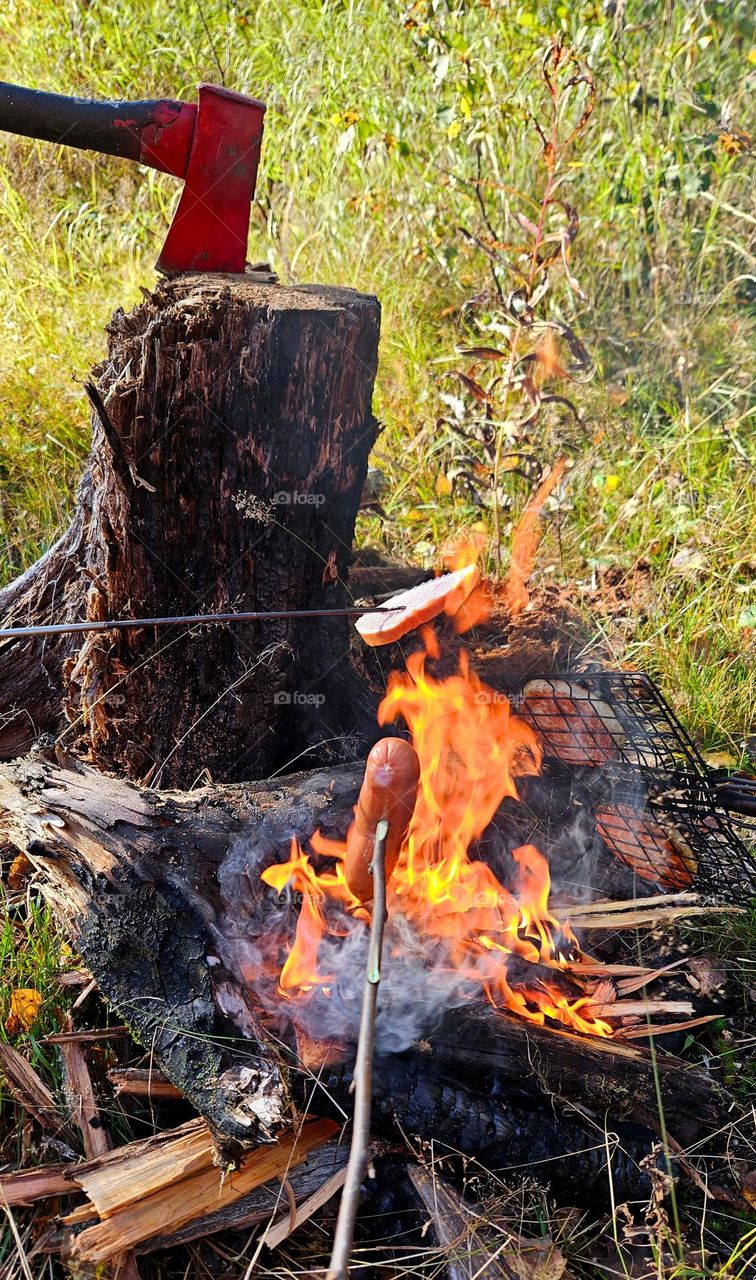 In the fall, it's wonderful to go to the Finnish forest to fry sausages over a campfire