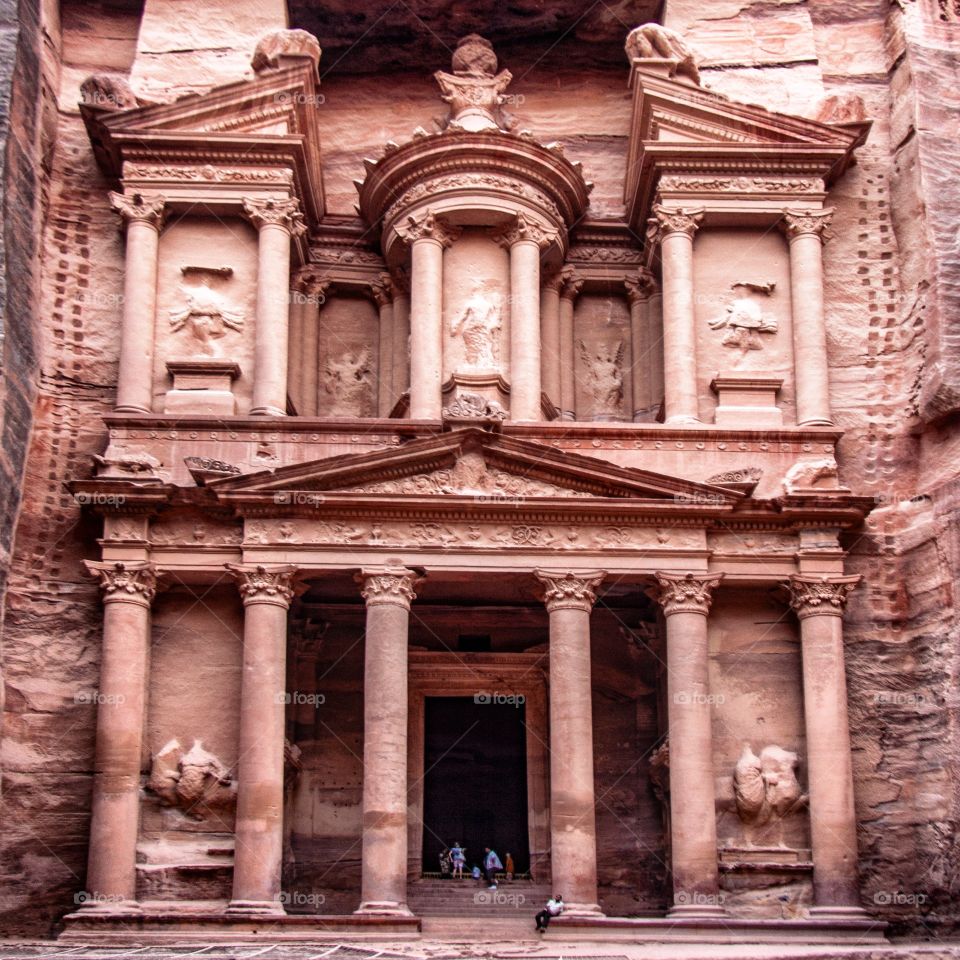 "The Treasury" (Al-Khazneh) is one of the most recognisable and elaborate temples in the ancient Arab Nabatean Kingdom city of Petra and was carved out of a sandstone rock face.