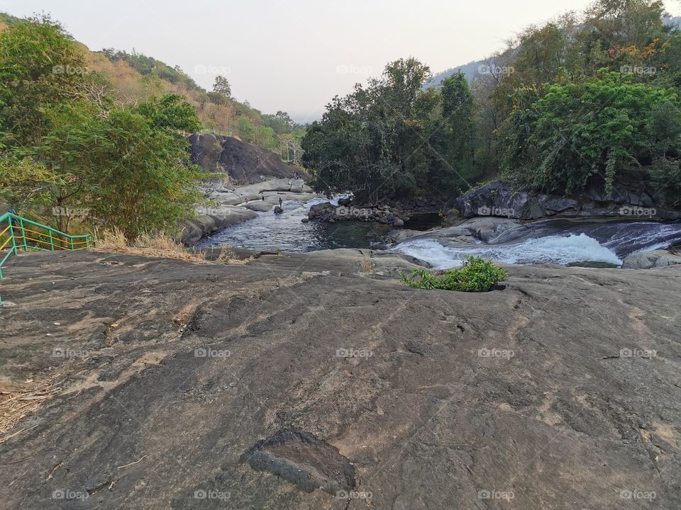 Huge rock and water falls in the Forest