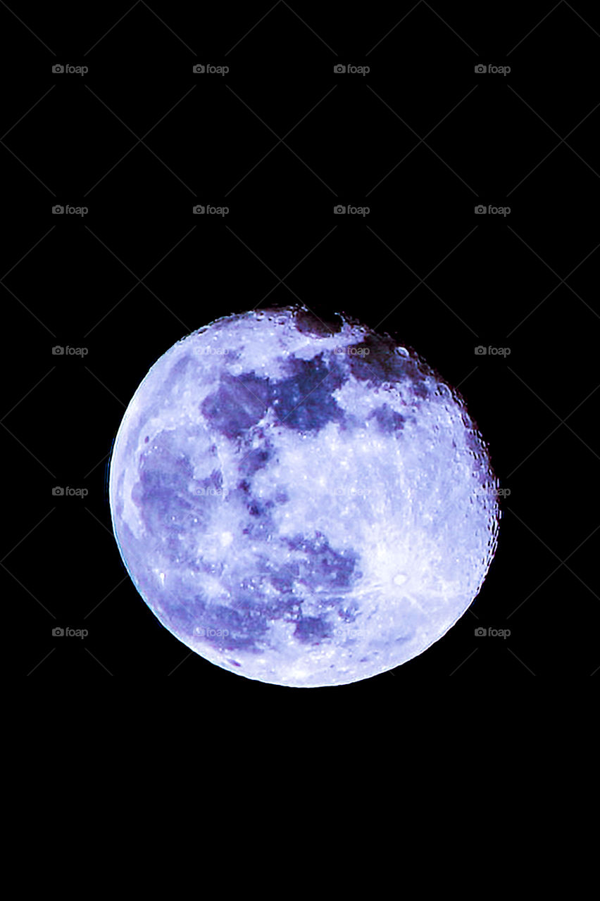 Once in a blue moon?? This colourful shot of a just past full moon is completely real except for the slightly blue hue. A real blue moon would the 2nd full moon in one calendar month. Still real & dreamy blue!๐