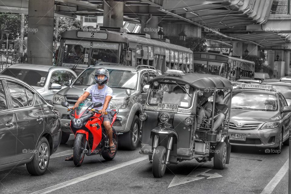 motorcyclist on busy Bangkok street