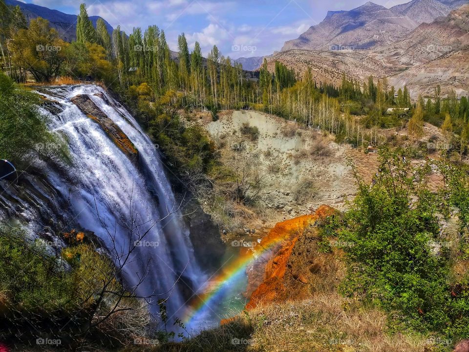 A beautiful waterfall with rainbow 🌱