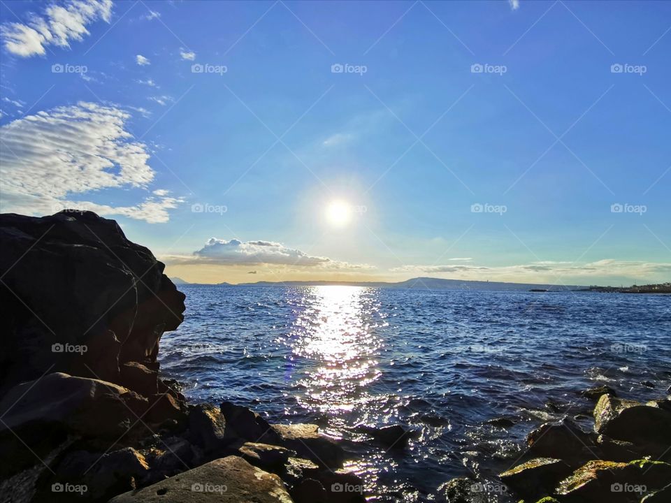 Beautiful sunset and nice sky with the sea view.