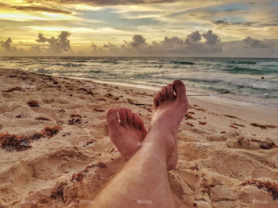 resting in the beach at sunrise