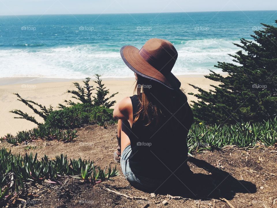 Female relaxing at the beach