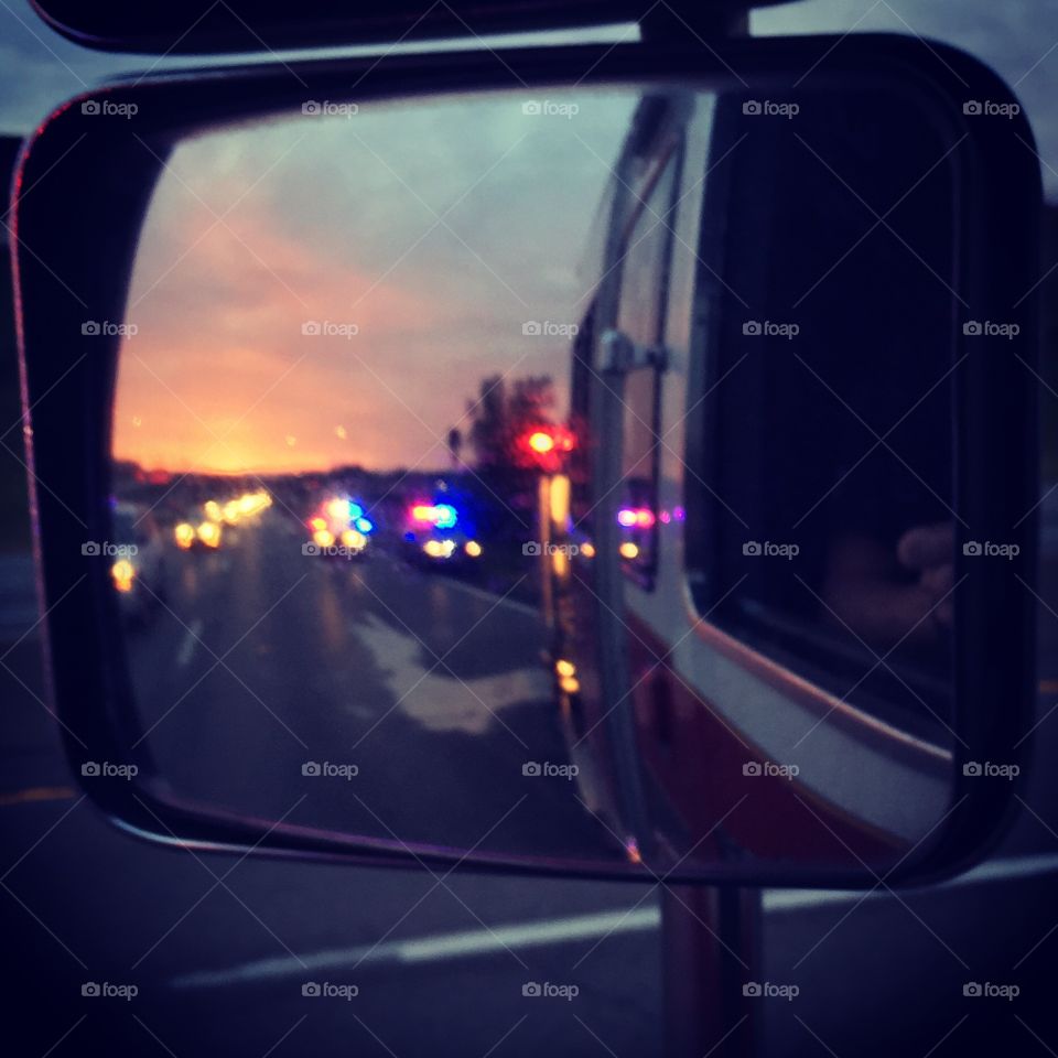 Traffic from the Truck. Blocking traffic on the interstate for the car wreck and watching the sunrise. 