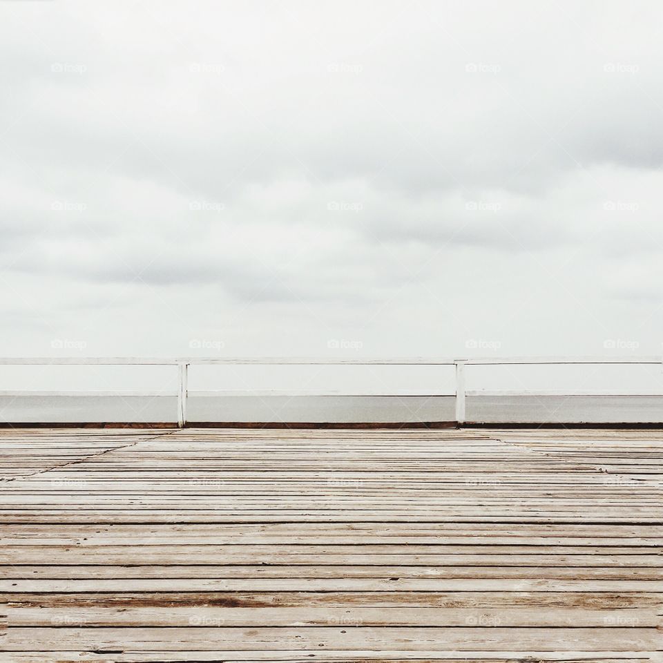 Closeup of pier over sea