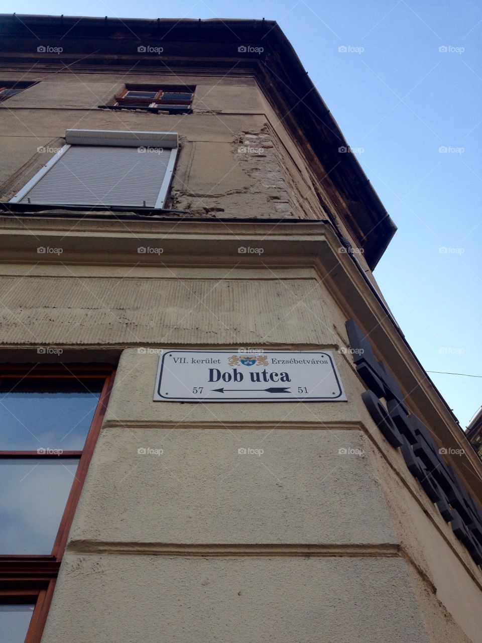 Dob street sign on a building in Budapest 