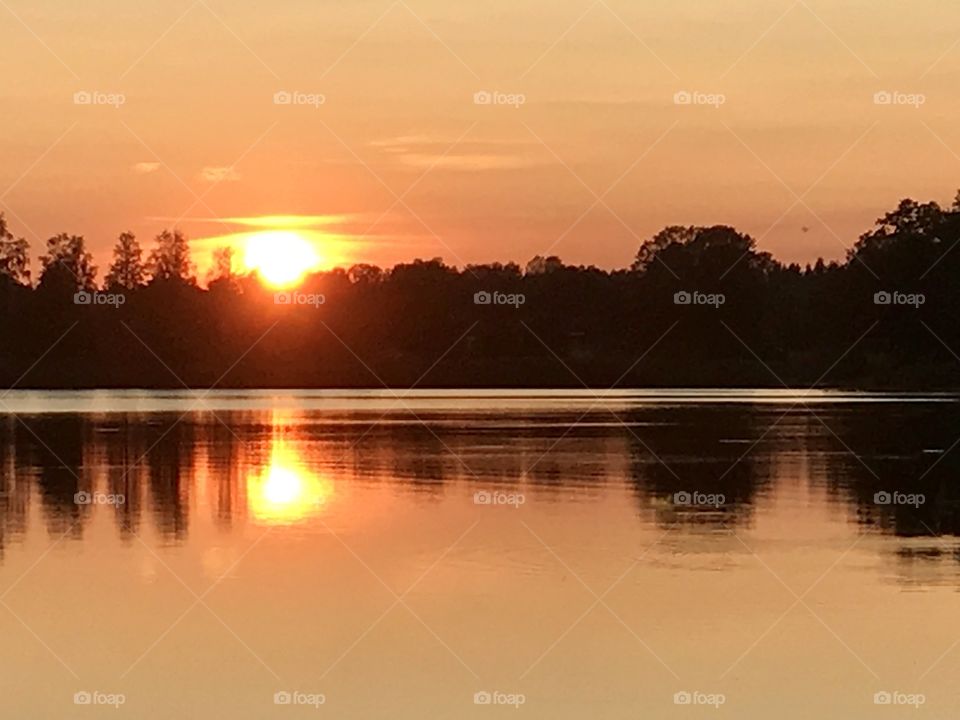 Golden sunset over lake