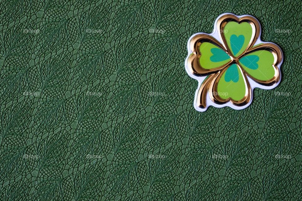 Shamrock With Green Background To Celebrate St. Patrick’s Day 