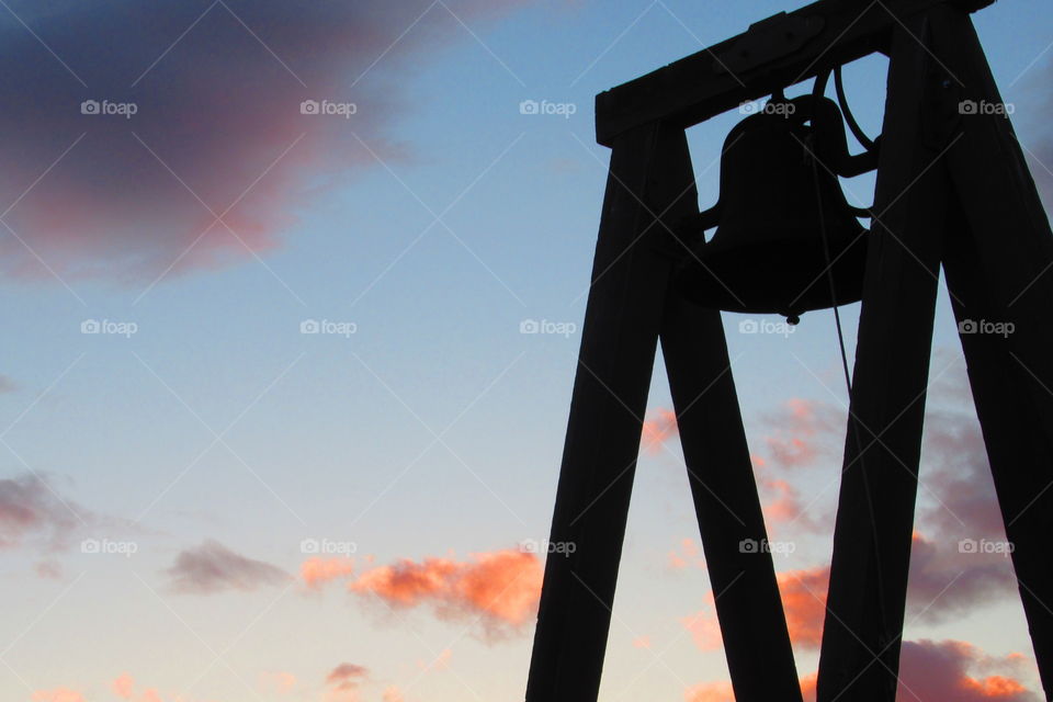 Church bell at sunset