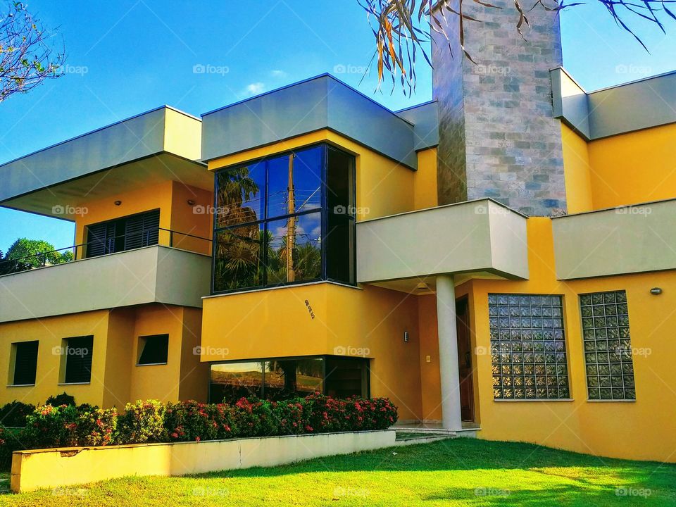 Beautiful yellow house in rectangular shape