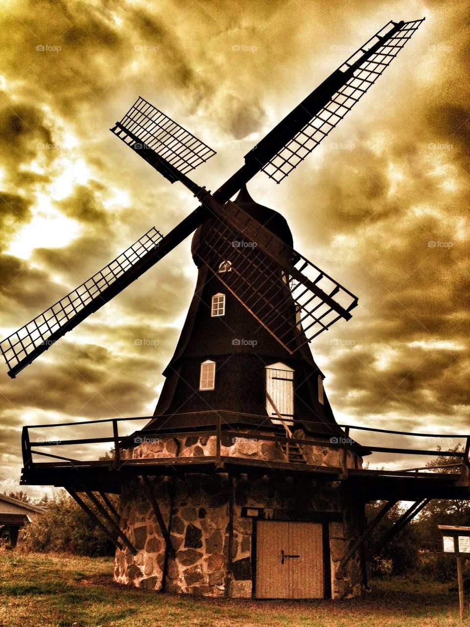 Windmill in an orange sky