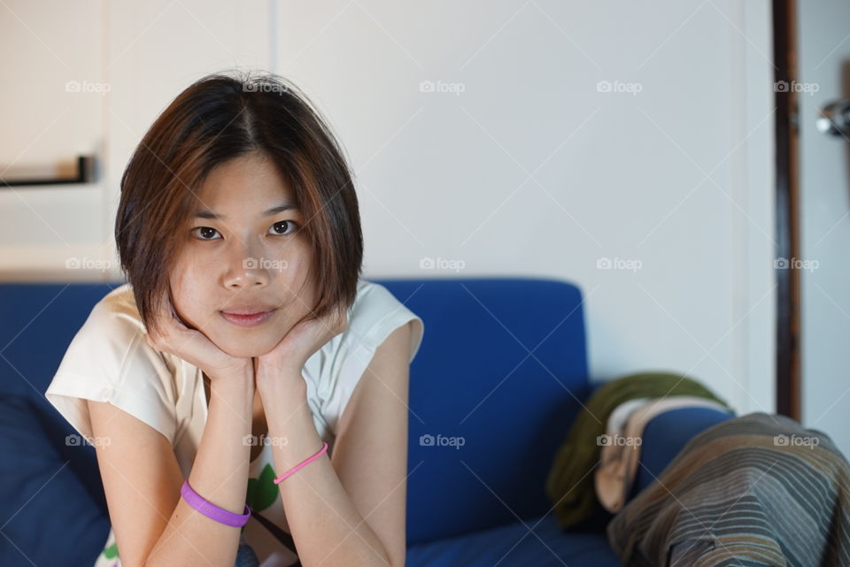 Cute Japanese girl on sofa