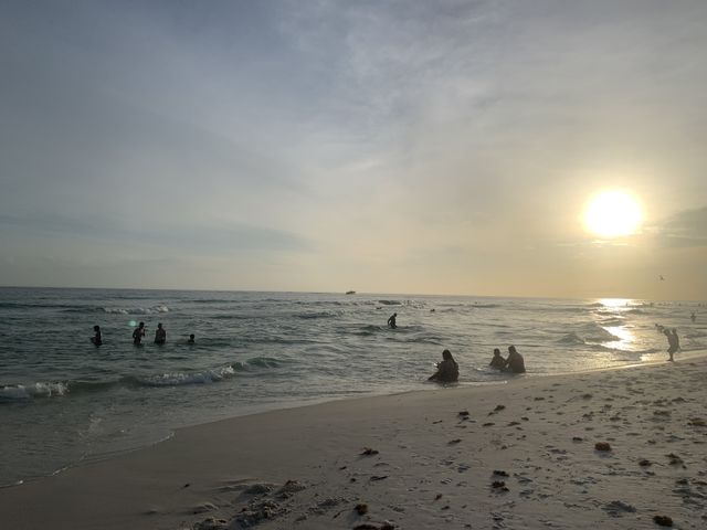 People swimming in the ocean post Covid-19 at Panama City Beach.