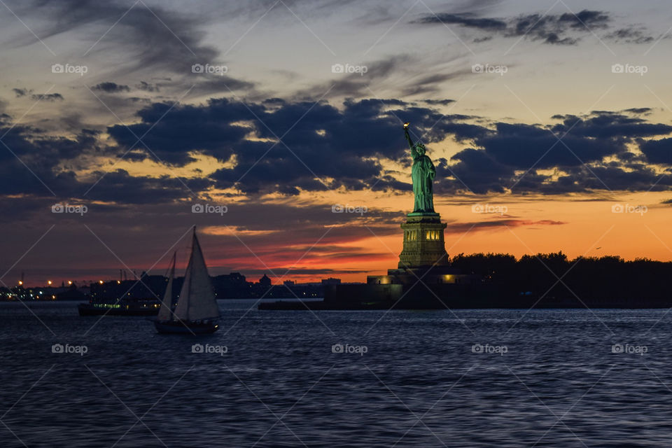 Statue of liberty during sunset
