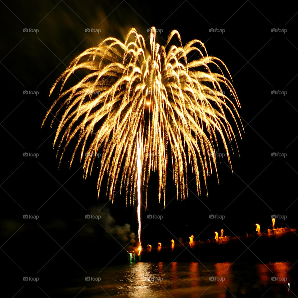 Firework display at night