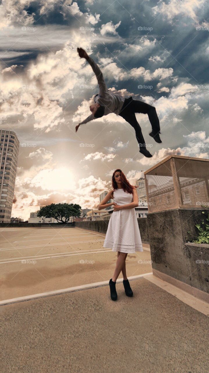 Redhead getting backflipped over on a rooftop in San Francisco 